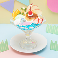 「すみっコぐらしカフェ～　ようこそ！たべもの王国～」「たべもの王国のソーダの湖」プリンアラモード（C）2023 San-X Co., Ltd. All Rights Reserved.